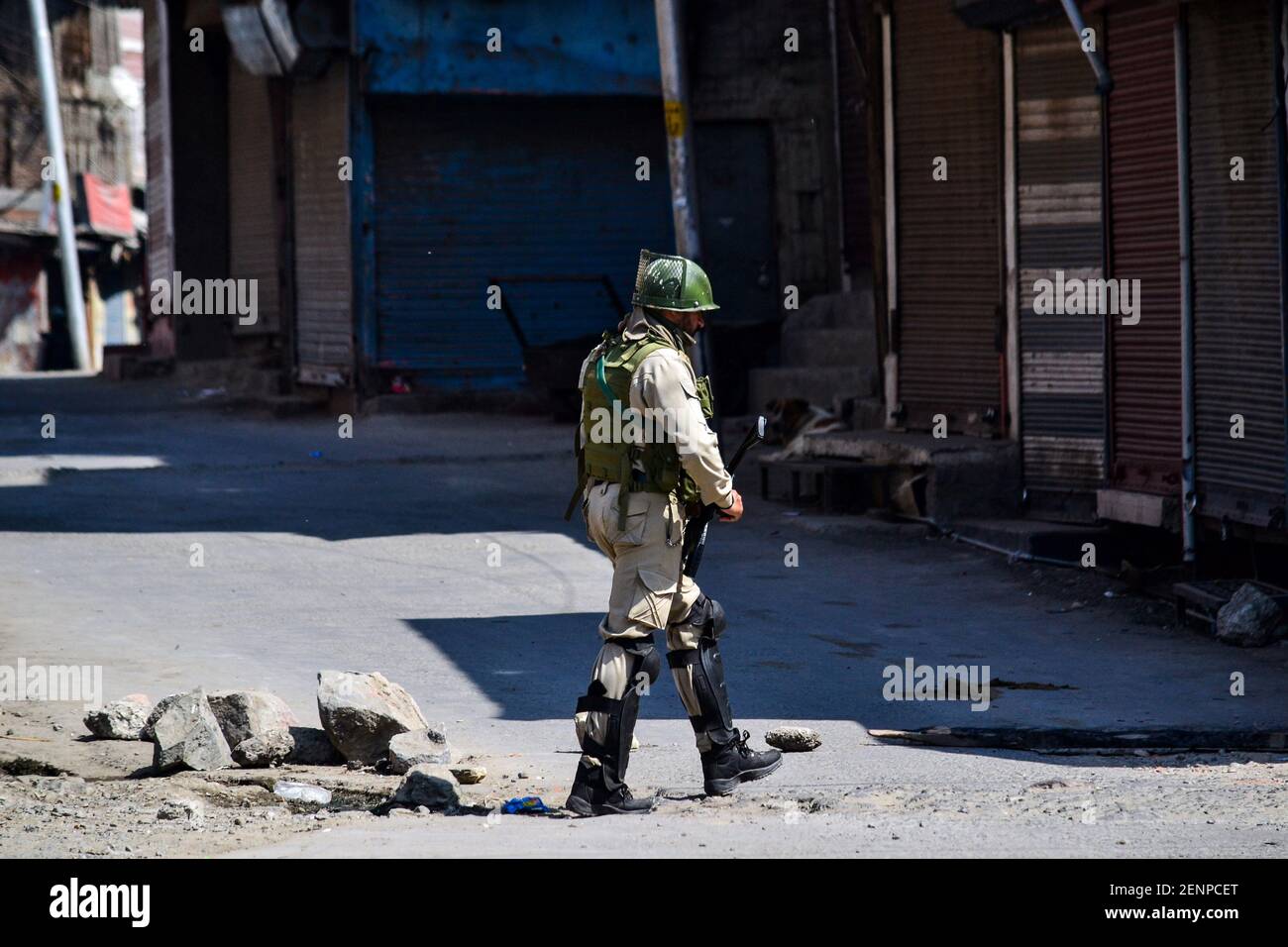 A paramilitary trooper patrols during restrictions in Srinagar, Kashmir. Kashmir valley remained shut for the 40th consecutive day following the scrapping of Article 370 by the central government which grants special status to Jammu & Kashmir. (Photo by Saqib Majeed / SOPA Images/Sipa USA) Stock Photo