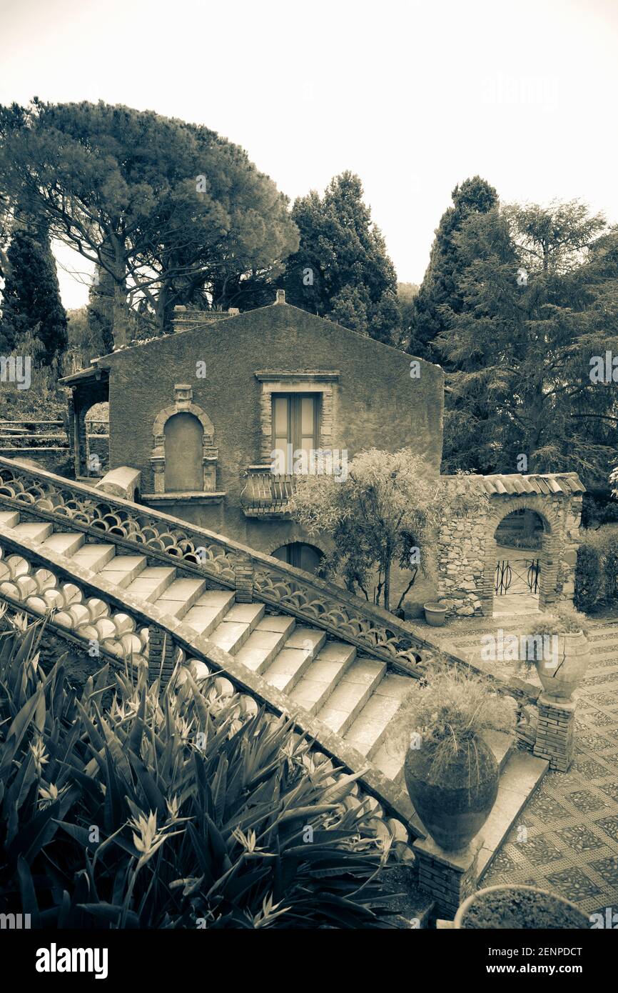 Italy,Sicily,Taormina, Villa Comunale, The Public Gardens,a typically Mediterranean array of hedges and flower-beds with cobbled paths Stock Photo