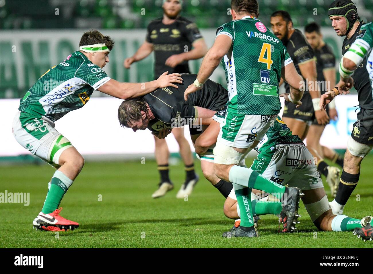 Treviso, Italy. 26th Feb, 2021. Gavin Thornbury (Connacht) tackled by  Dewaldt Duvenage (Benetton Treviso) and Davide Ruggeri (Benetton Treviso)  during Benetton Treviso vs Connacht Rugby, Rugby Guinness Pro 14 match in  Treviso,