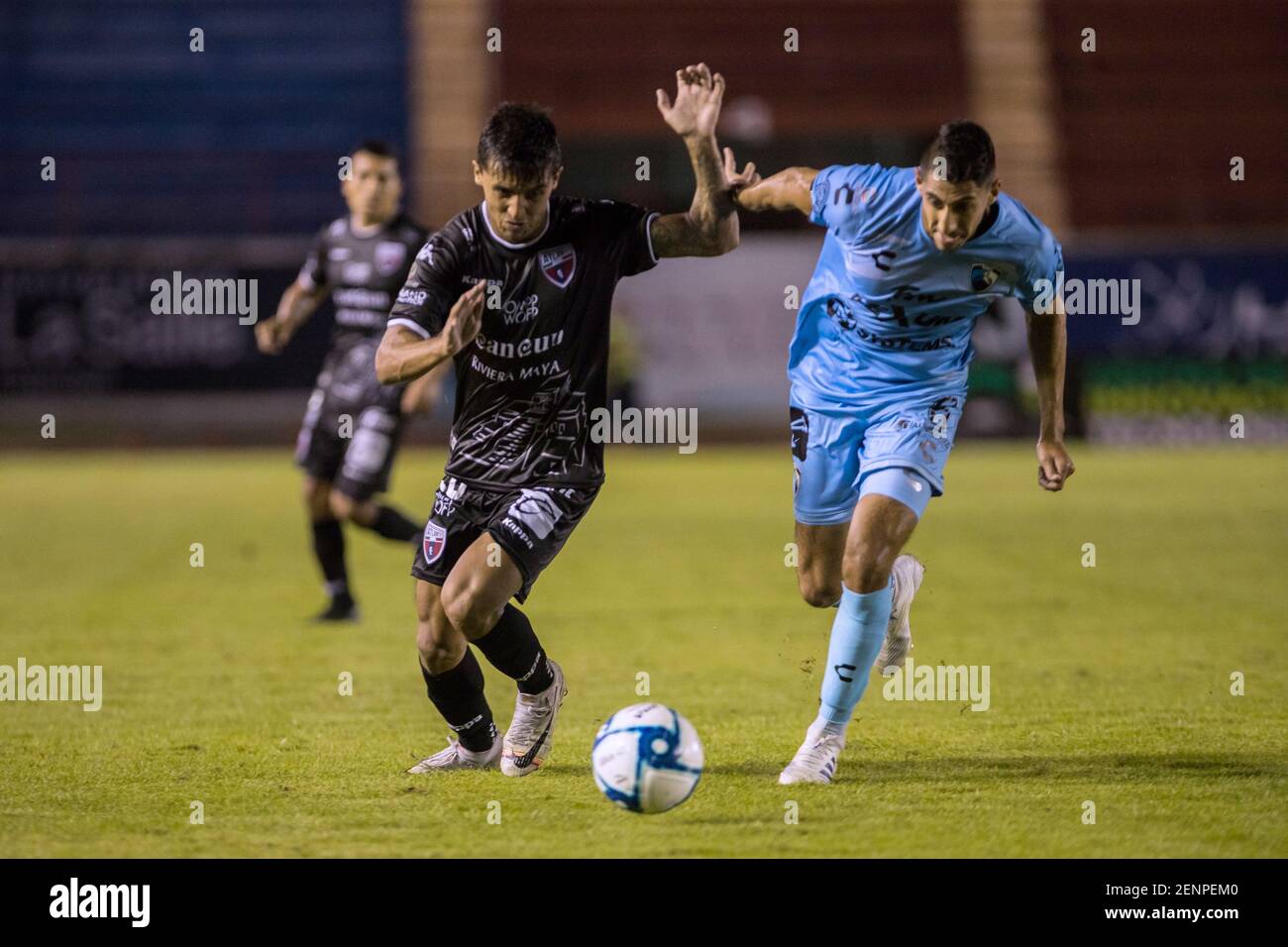 CANCUN , MEXICO - SEPTEMBER 12: Omar Islas of Atlante #24 and Carlos  Alberto Zamora of Tampico Madero #6 in action during a match between  Tampico Madero and Atlante FC as part