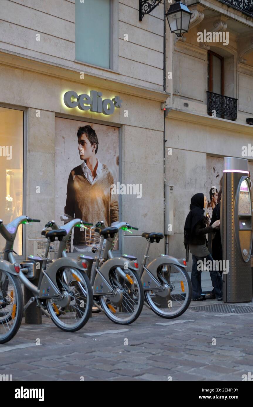 Bicycles for rent on a Paris street, Paris, Île-de-France, France Stock Photo