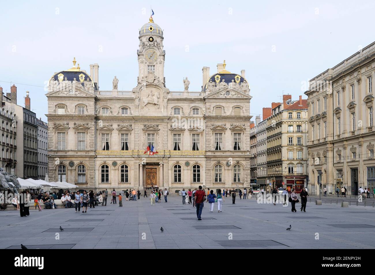 A crowd of people on the Place des Terreaux with the Hotel de Ville in the background Stock Photo
