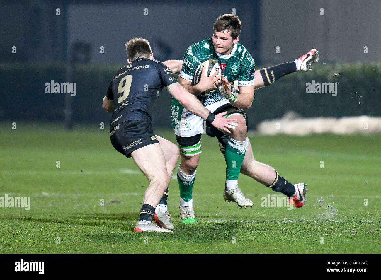 Treviso, Italy. 26th Feb, 2021. Manuel Zuliani (Benetton Treviso) carries  the ball hindered by Kieran Marmion (Connacht) during Benetton Treviso vs  Connacht Rugby, Rugby Guinness Pro 14 match in Treviso, Italy, February