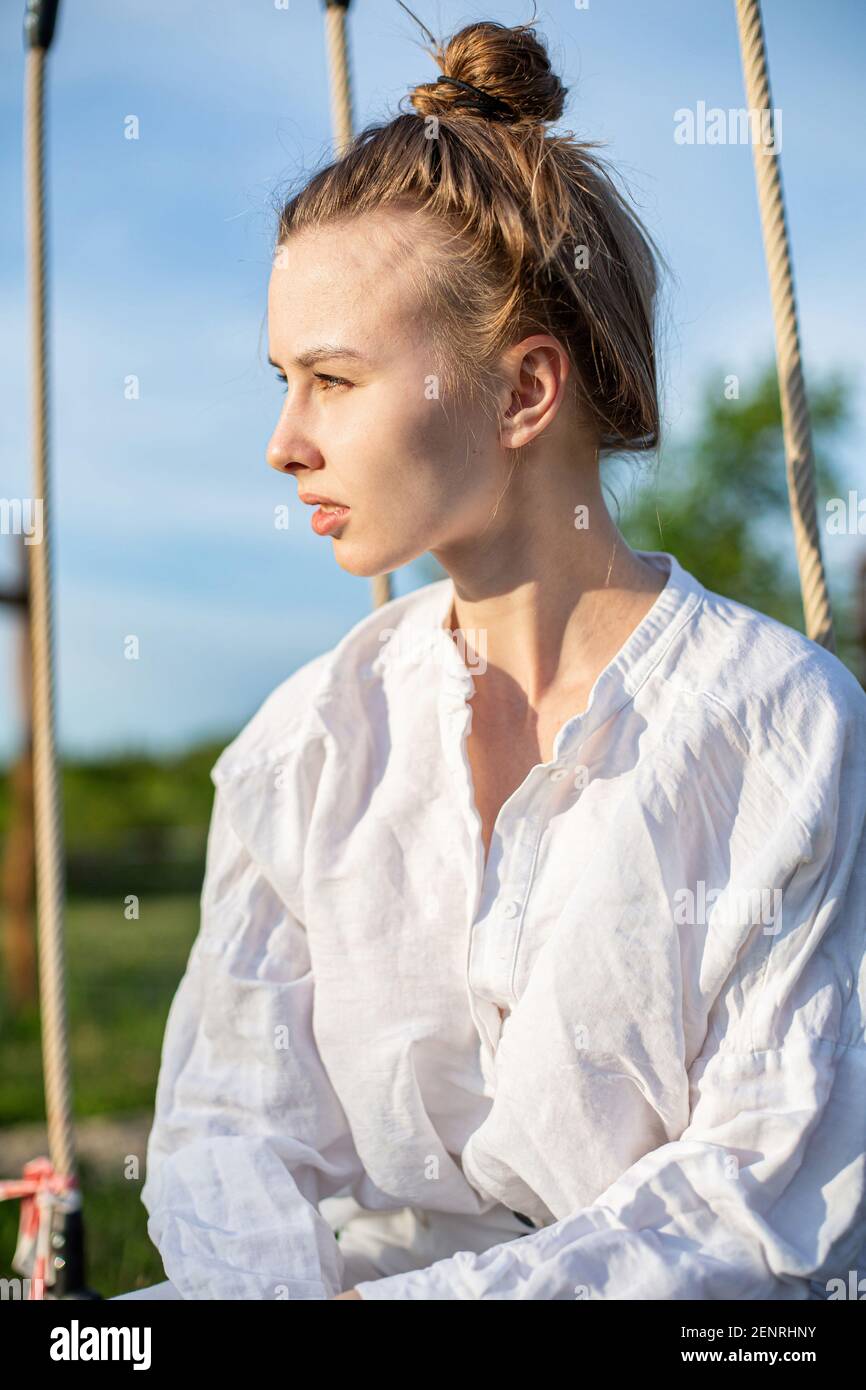 Blond hair pulled back hi-res stock photography and images - Alamy