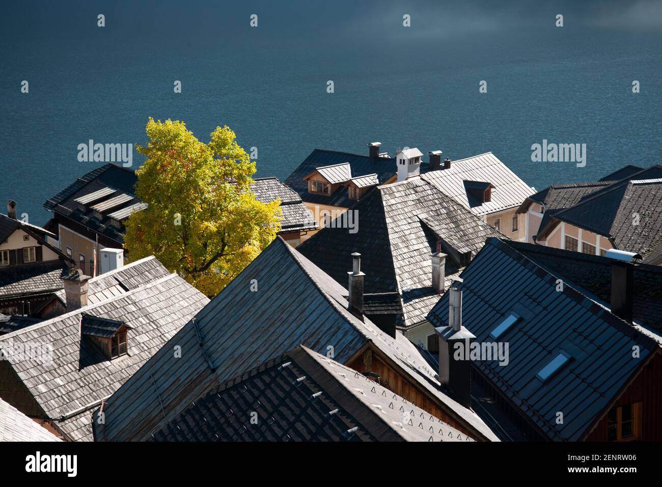 wooden roofs and boat-houses of Hallstatt village on the lakeshore of Hallstaetter See, Upper Austria, Inneres Salzkammergut Stock Photo