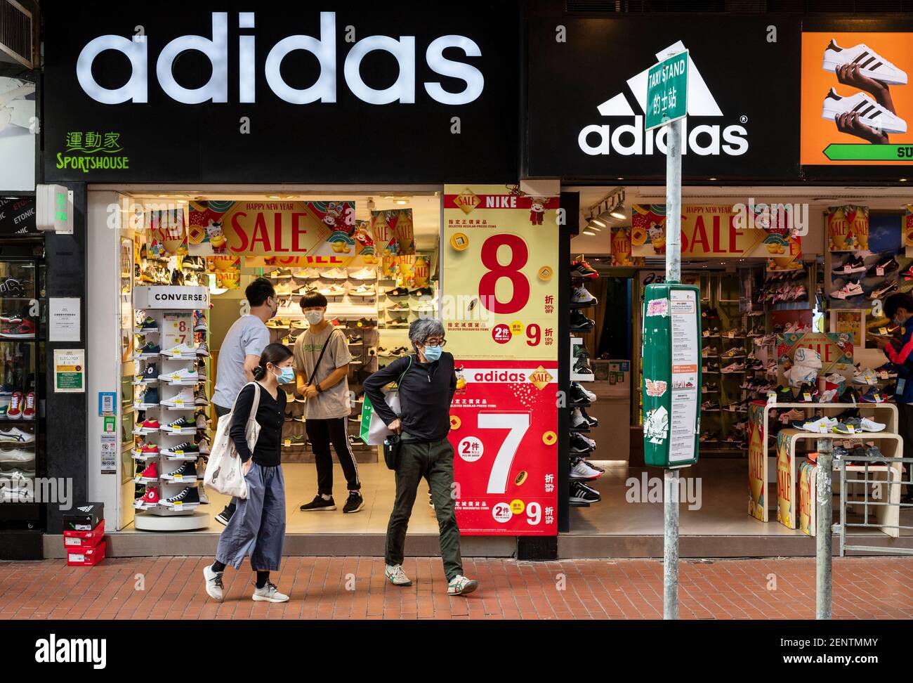 Pedestrians walk past the German multinational sportswear clothing brand,  Adidas store seen in Hong Kong Stock Photo - Alamy