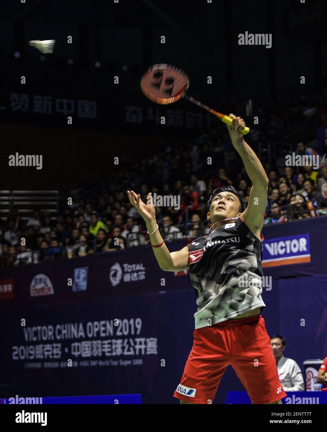 Japanese professional badminton player Kento Momota competes against
