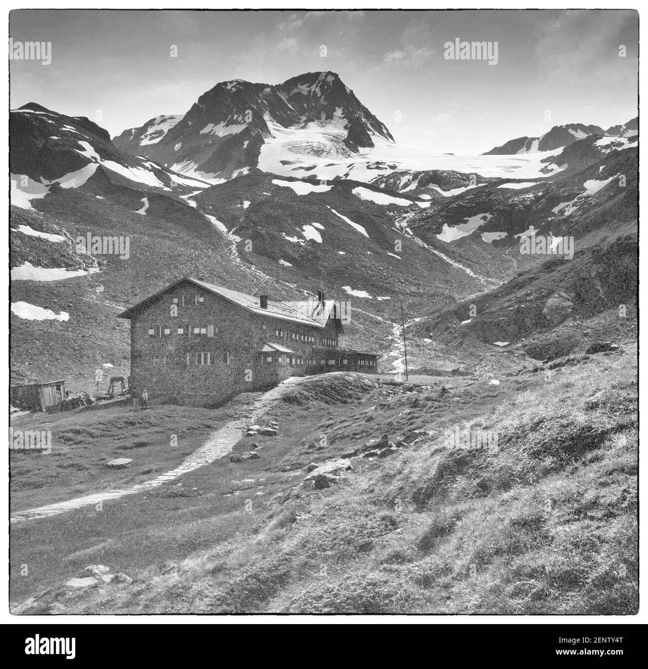 Austria, Tyrol. This is of the German Alpine Club, DAV, Dresden mountain Hut refuge at the head of the Stubaital valley looking towards the Schaufel Spitze mountain as it was in 1968 all prior to when the area was pristine before heavily engineered by the Stubai Glacier Company into a ski area now littered with ski tow pylons, restaurants and cafes. Stock Photo