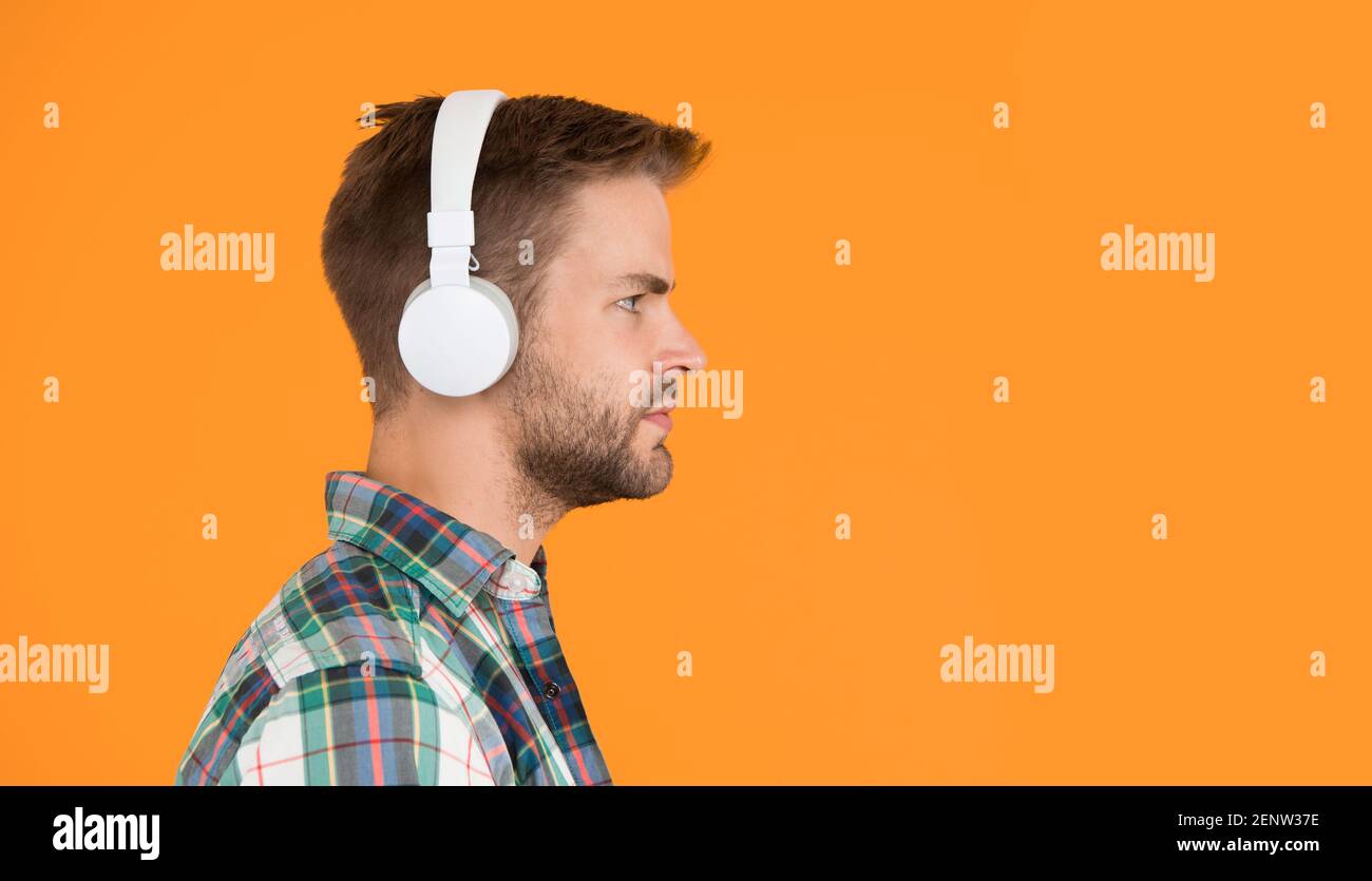 Recording sample. Stereo sound. Hipster listen music. Music taste. Man in  earphones. Mp3 player. Education audio book. Modern technology. Handsome  radio host. Music chart. Creating sound and songs Stock Photo - Alamy