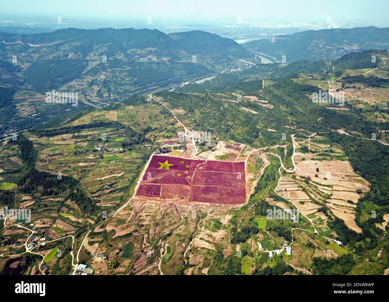 An aerial view of the large national flag of 125 acres compsed by ...