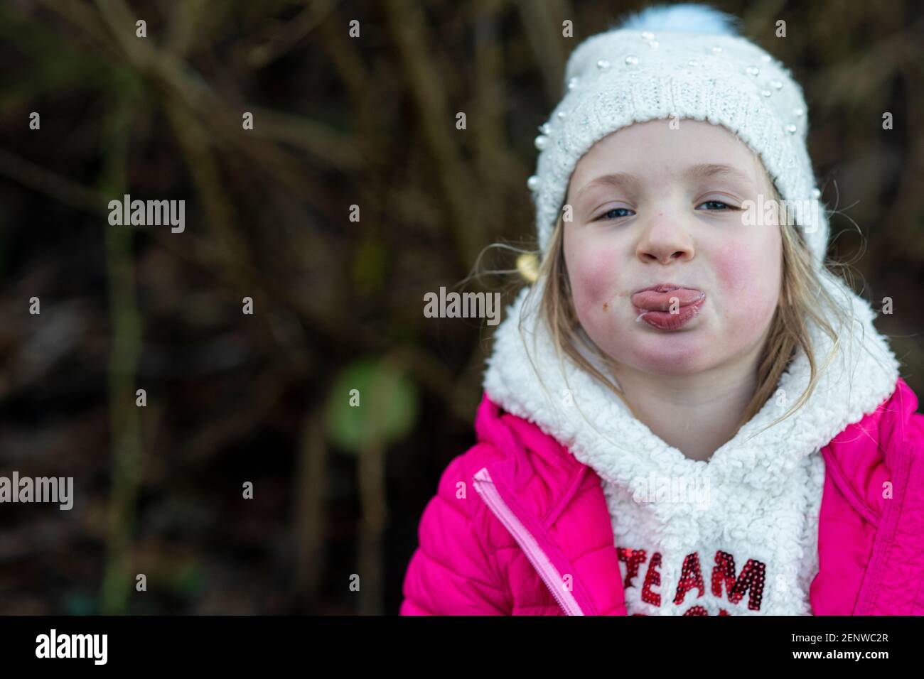 Little girl tongue out hires stock photography and images Alamy