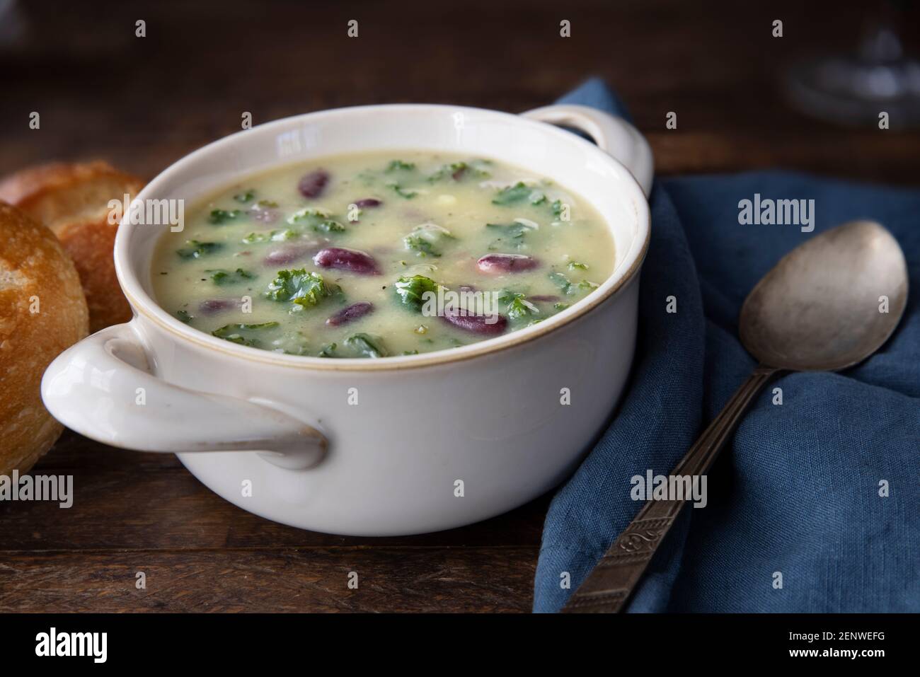 Portuguese Caldo Verde soup with spoon . Stock Photo
