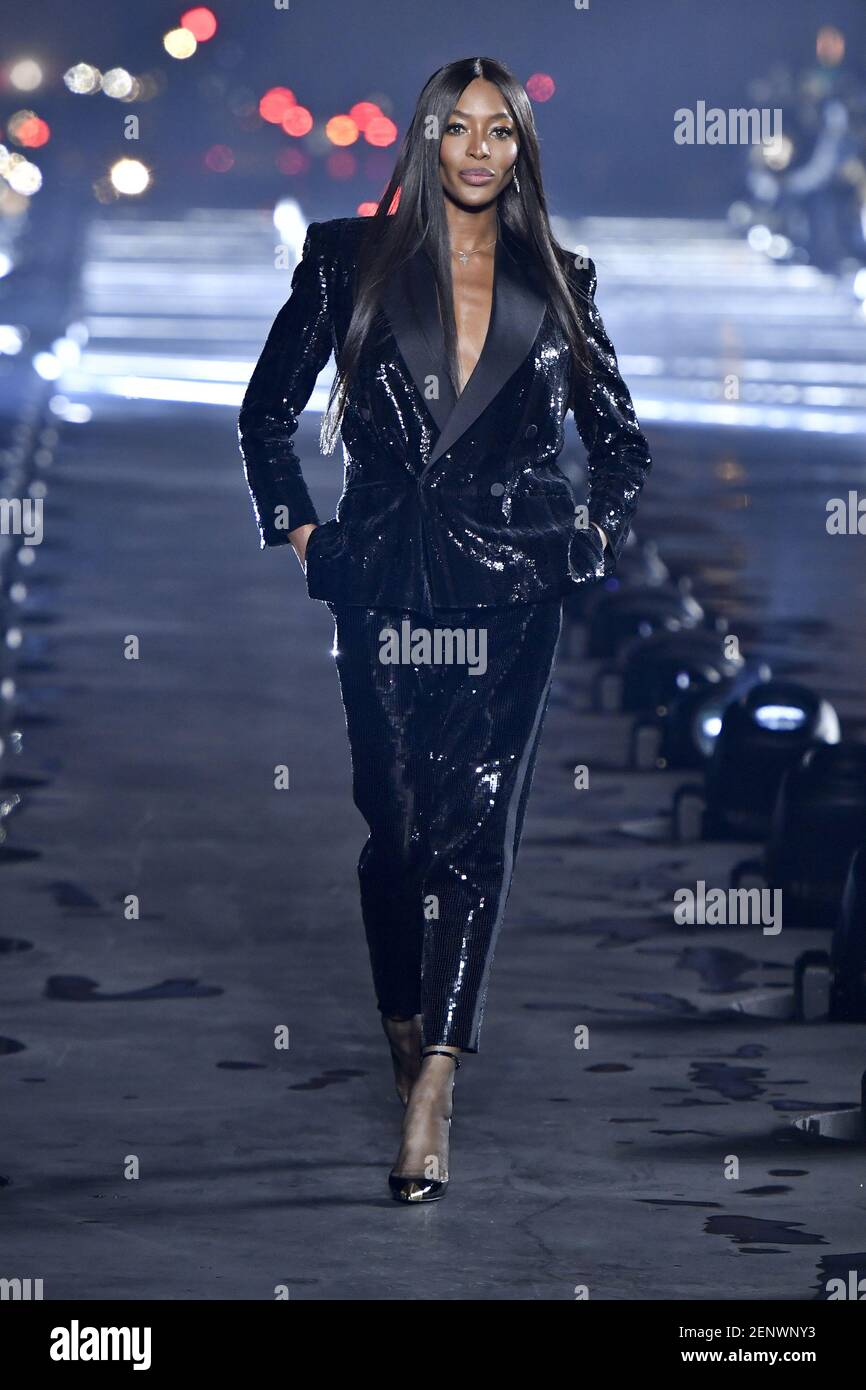 Model Naomi Campbell walking on the runway during the Yves Saint
