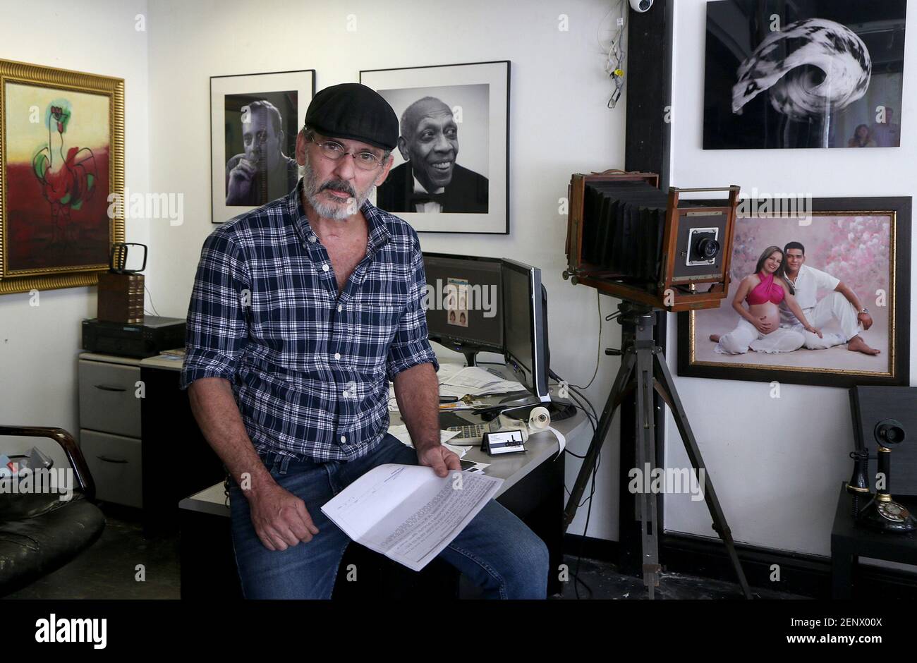 Delio Regueral, At His Studio In Miami. A Prominent Cuban Photographer 