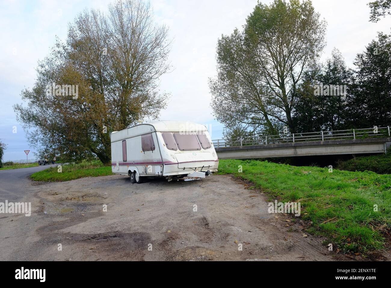 October 2020 - Large touring caravan dumped on the roadside near Glastonbury, Somerset, UK Stock Photo