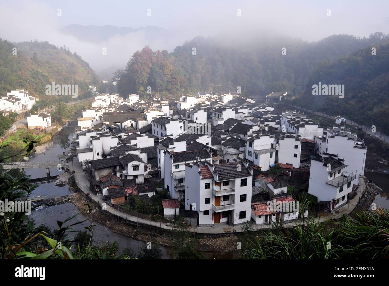 Jiangxi ,CHINA-Jujing village is located in the big zhang mountain township of Wuyuan county, Shangrao city, Jiangxi province.The whole village has a unique layout and profound cultural deposits. It is a typical village surrounded by mountains and water, surrounded by high mountains and a stream. It is in line with the design of "behind mountains and in front of water" of the eight diagrams of China, and is known as "the most round village in China", just like a paradise.(EDITORIAL USE ONLY. CHINA OUT) (Photo by /Sipa USA) Stock Photo