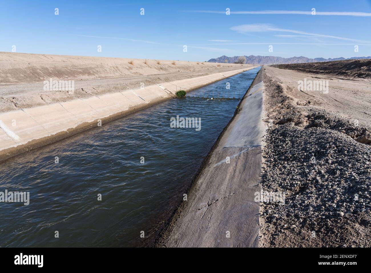 A cementlined irrigation canal carries water from the Colorado RIver to irrigate the farms in