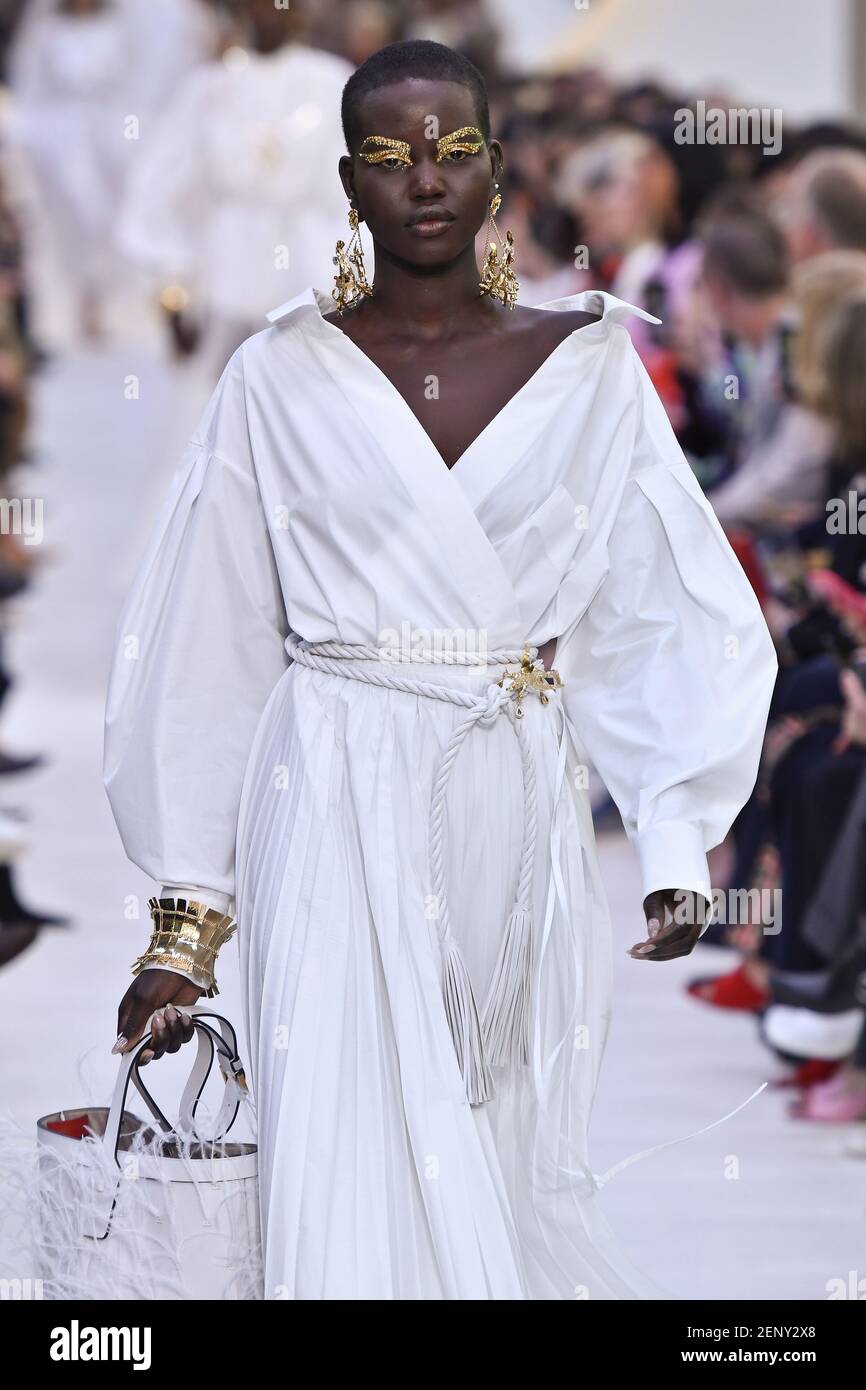Model Adut Akech walking on the runway during the Valentino Ready to ...