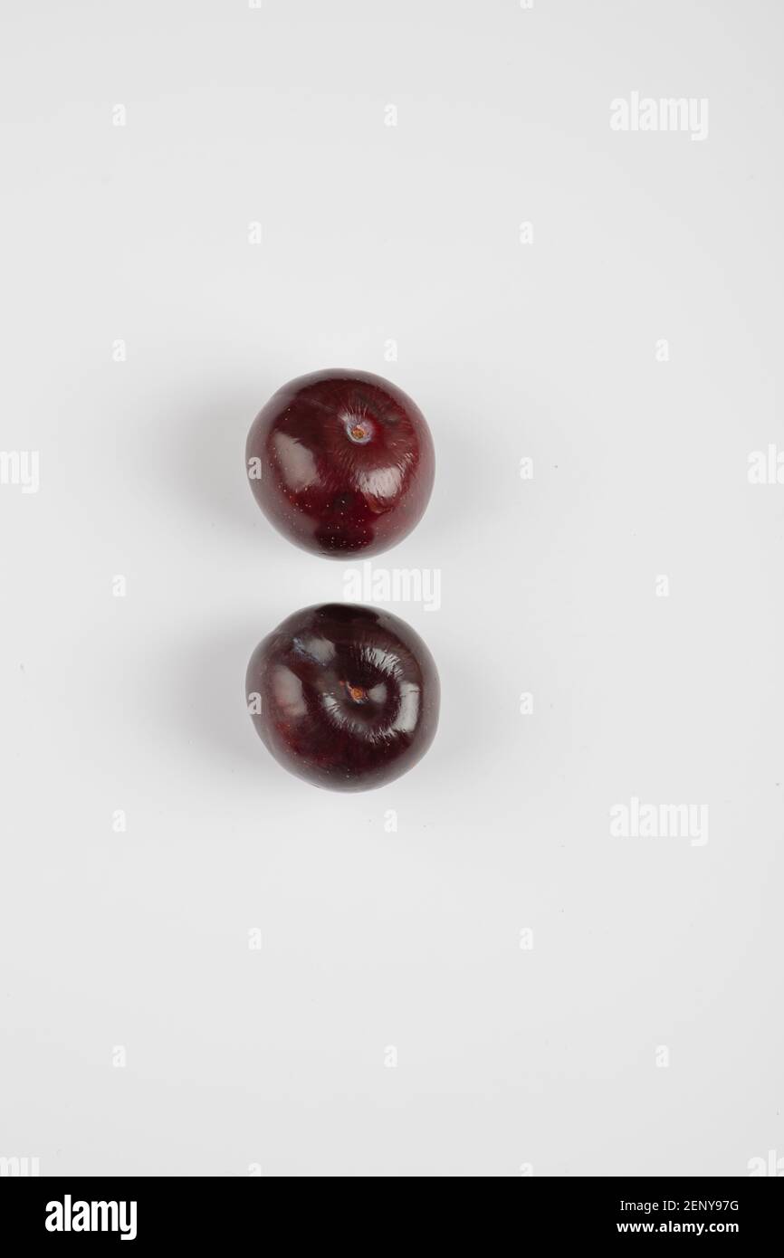 Two cherry plums isolated on white background Stock Photo