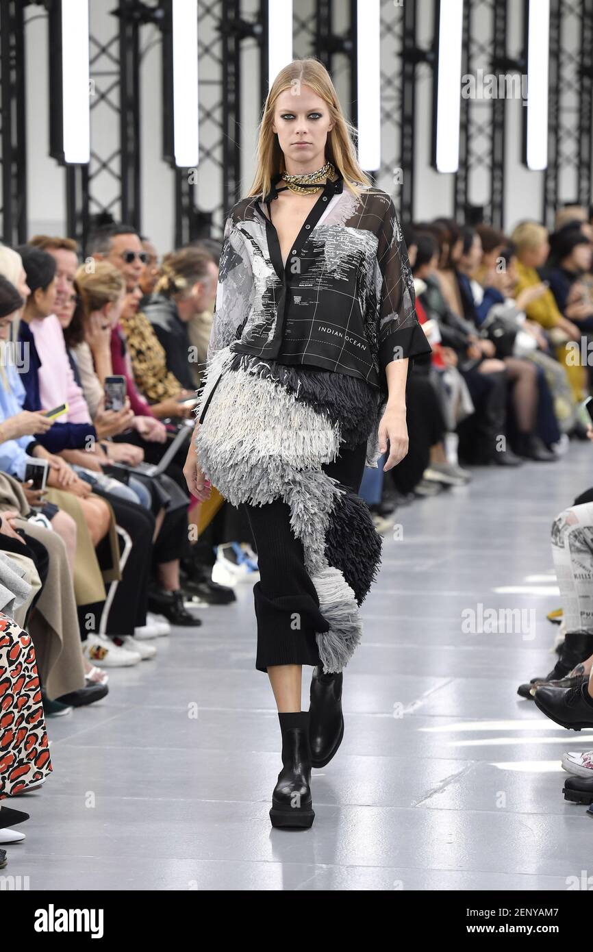 Model Lexi Boling walking on the runway during the Sacai Ready to