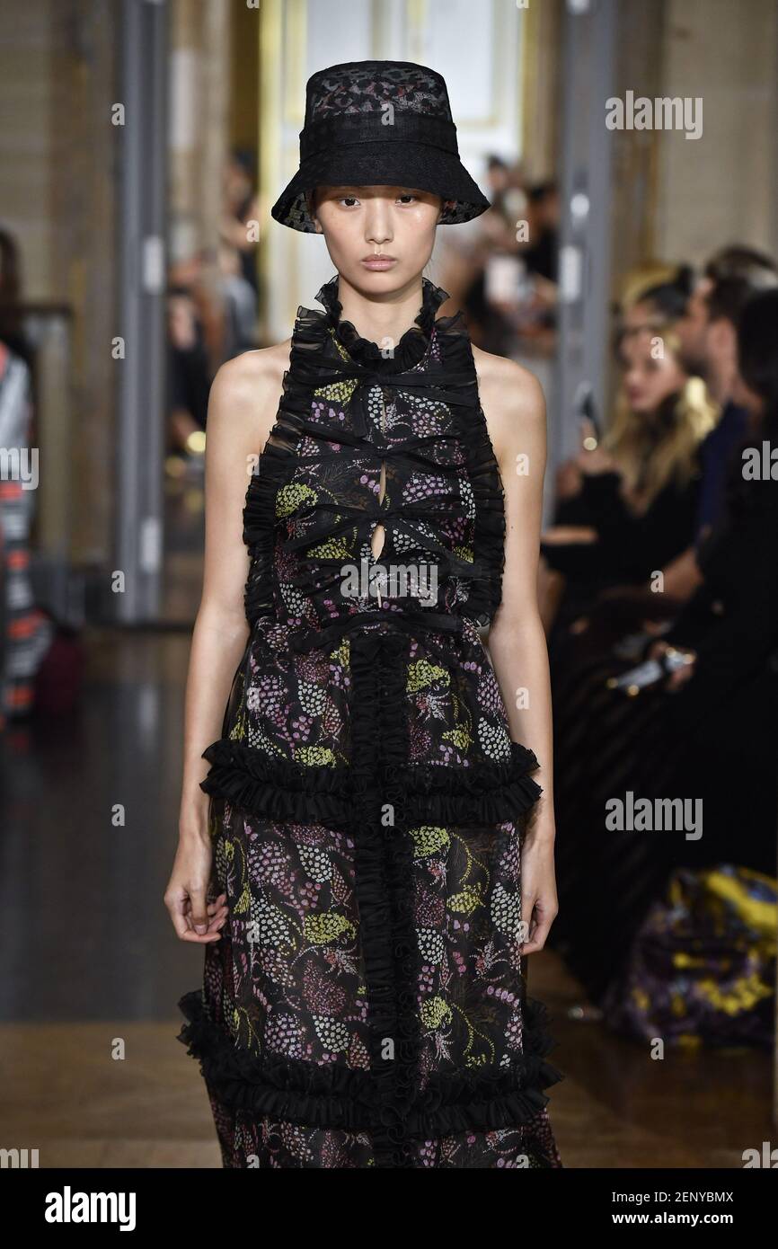 Model Tinglei Liu walking on the runway during the Giambattista Valli ...