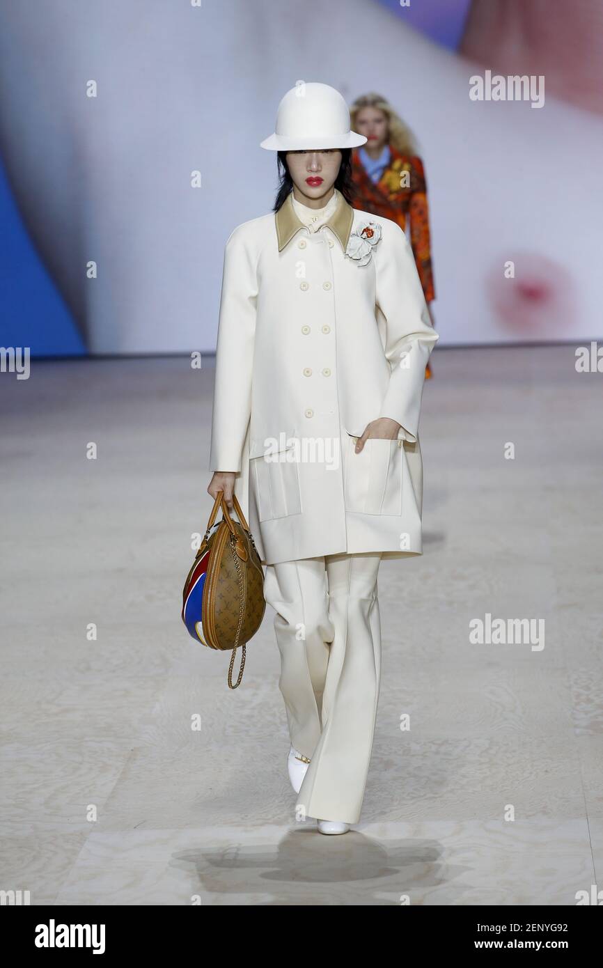 Sora Choi walks the runway during the Dior Haute Couture