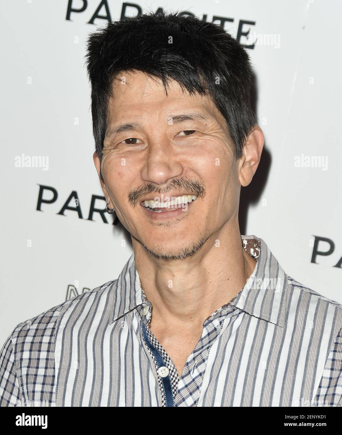 Gregg Araki arrives at the PARASITE Los Angeles Premiere held at the