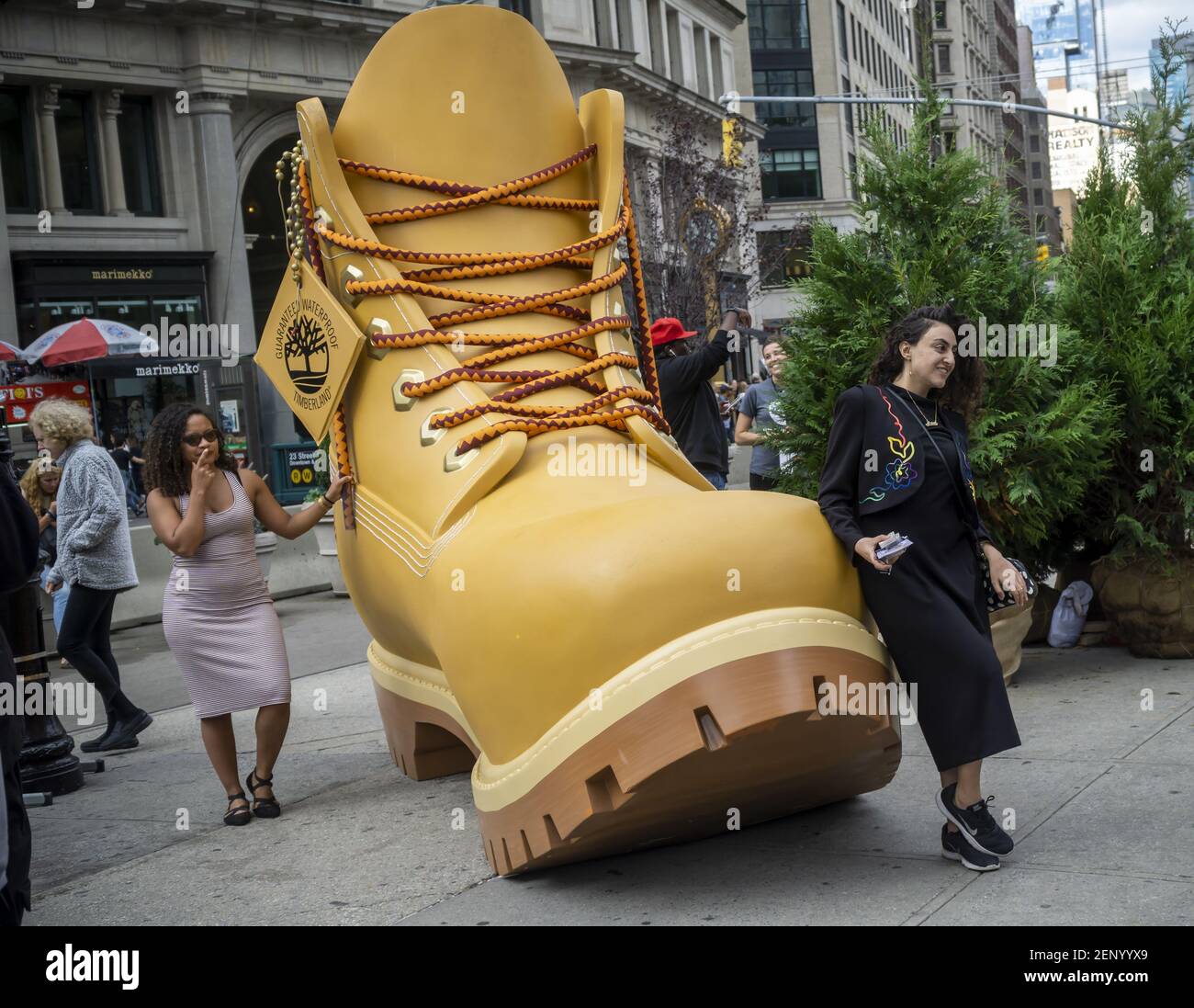Visitors to Flatiron Plaza in New York on Friday, October 4, 2019  participate in a branding event for VF Corp.'s Timberland boots and apparel  brand. By taking a pledge to support the