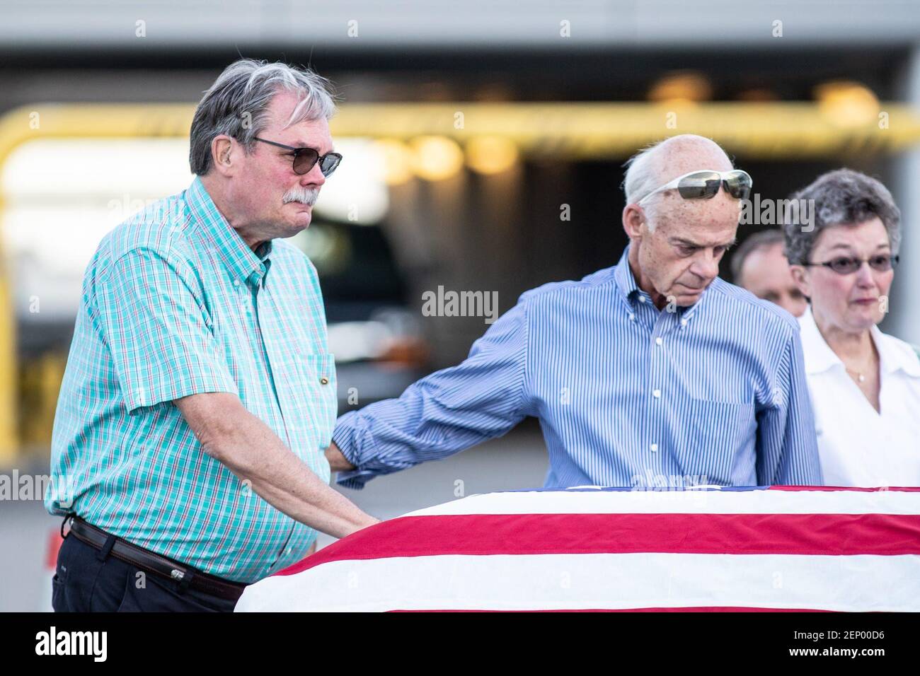 Family members greet the body of 1st Lt. Alan Jensen Bardach as he is received by the Indiana National Guard Ceremonial Unit, and is repatriated from Vietnam with a planeside honors ceremony at the Indianapolis International Airport on Thursday, October 3, 2019. 0027 4gallery (Photo by Michelle Pemberton/IndyStar, Indianapolis Star via Imagn Content Services, LLC/USA Today Network/Sipa USA) Stock Photo