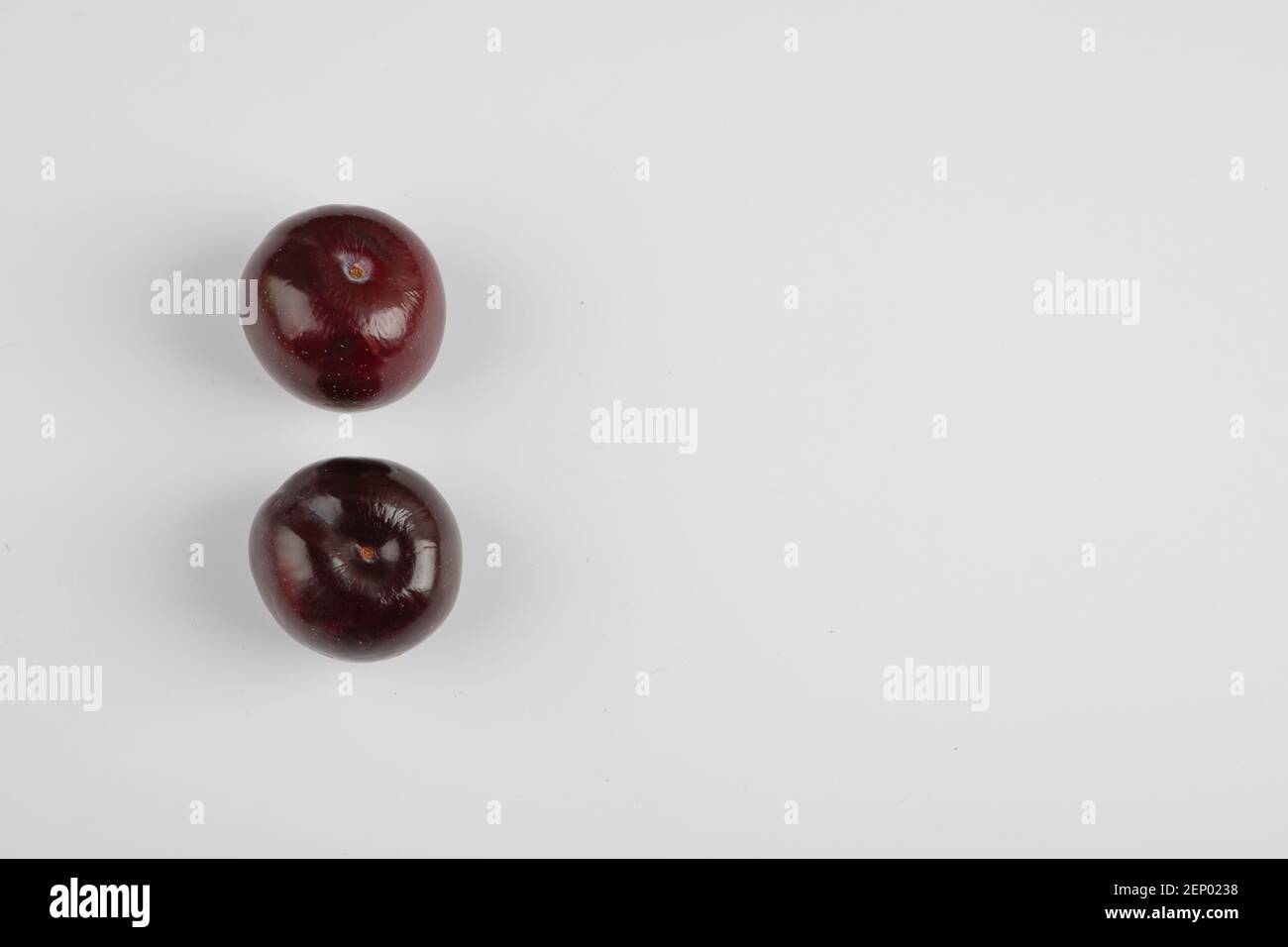 Two cherry plums isolated on white background Stock Photo