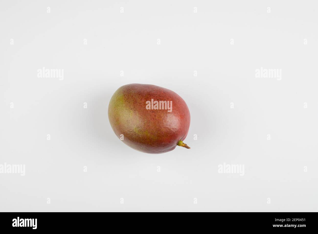 Delicious exotic mango fruit isolated on white background Stock Photo