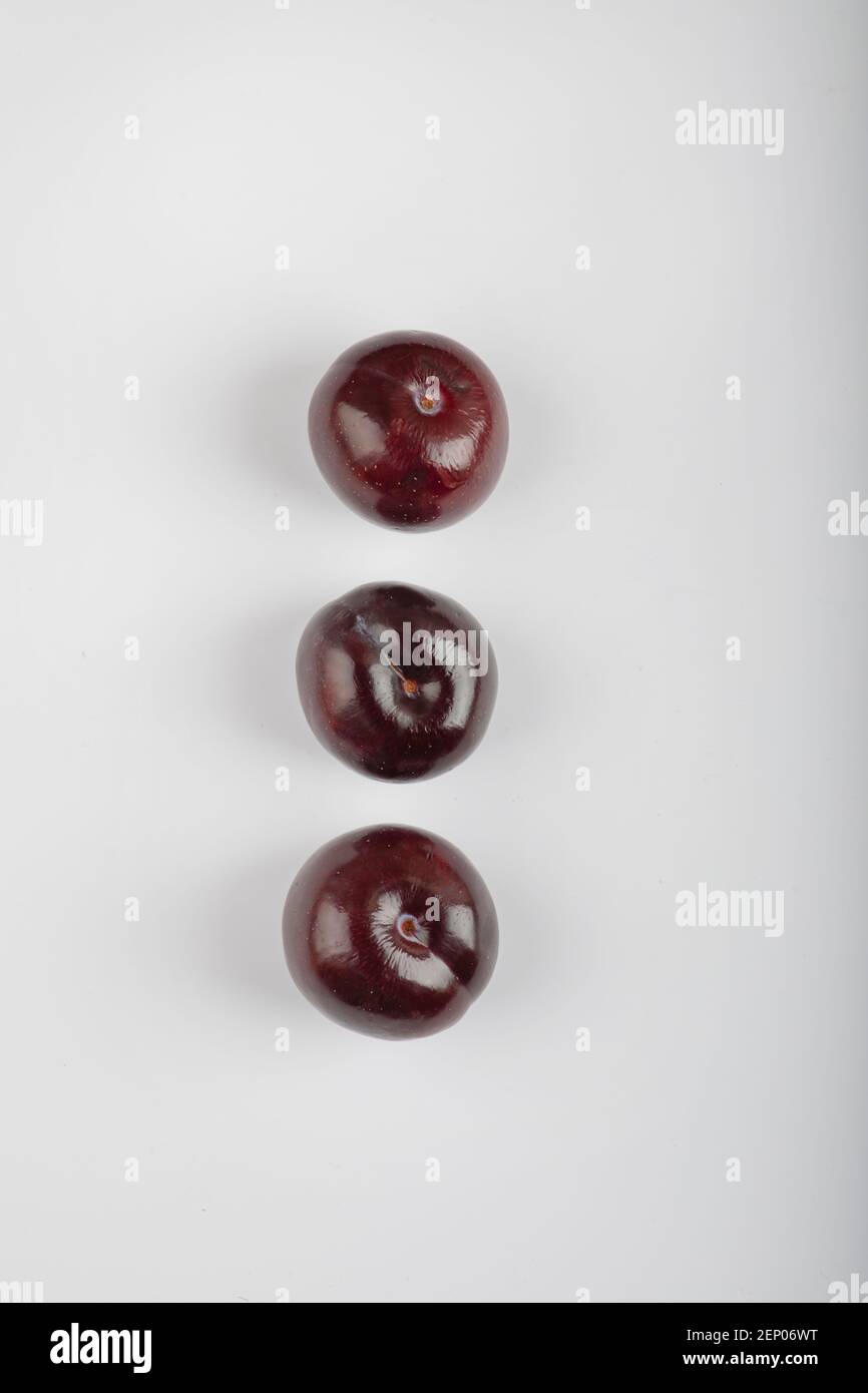 Three cherry plums isolated on white background Stock Photo