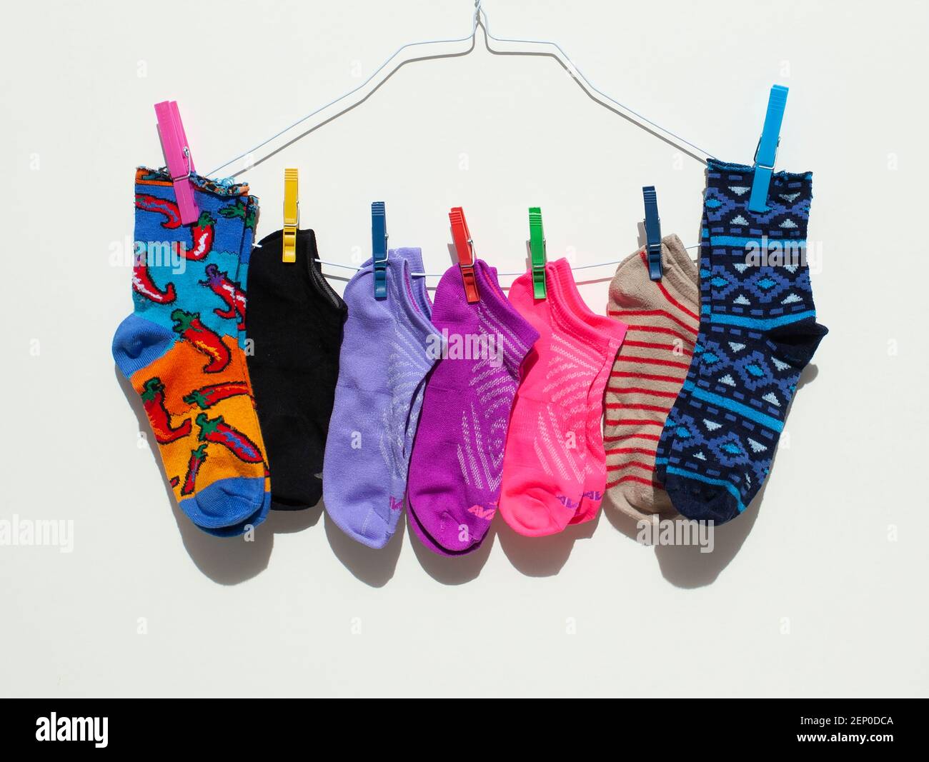 Image of Colorful Socks on a Hanger Stock Photo