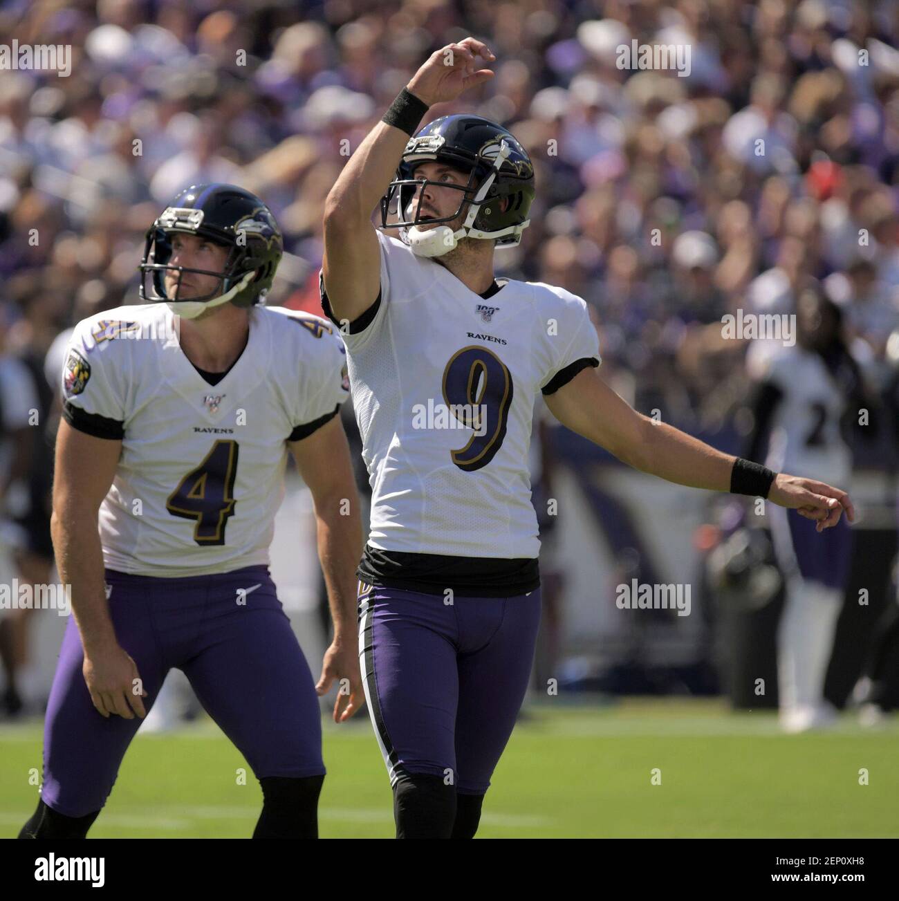 Baltimore Ravens punter Sam Koch (4) watches the ball clear the uprights  for a field goal by kicker Justin Tucker. (Photo by Karl Merton  Ferron/Baltimore Sun/TNS/Sipa USA Stock Photo - Alamy