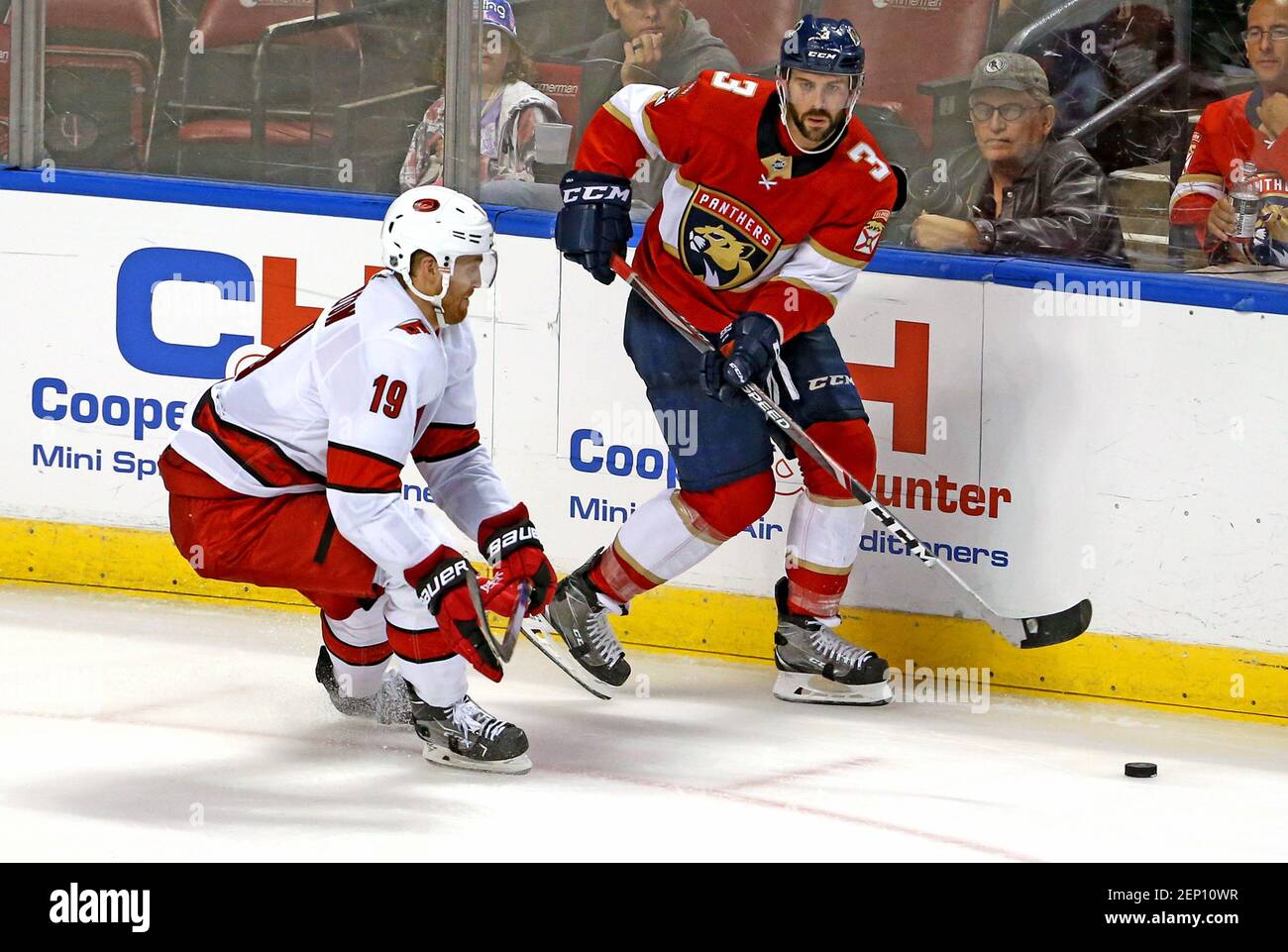 Florida Panthers defenseman Keith Yandle (3) skates for the puck against Carolina Hurricanes defensemen Dougie Hamilton (19) during the third period of an NHL hockey game at the BB&T Center Tuesday, Oct. 8, 2019 in Sunrise, Fla. (Photo by David Santiago/Miami Herald/TNS/Sipa USA) Stock Photo
