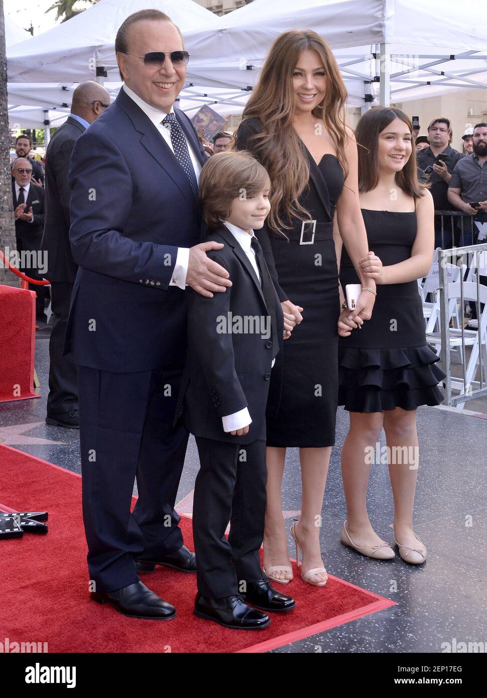 L-R) Tommy Mottola, Son Matthew Alejandro Mottola Sodi, Wife Thalia and  Daughter Sabrina Sakaë Mottola Sodi arriving at the Tommy Mottola Star On  The Hollywood Walk Of Fame Ceremony held in front