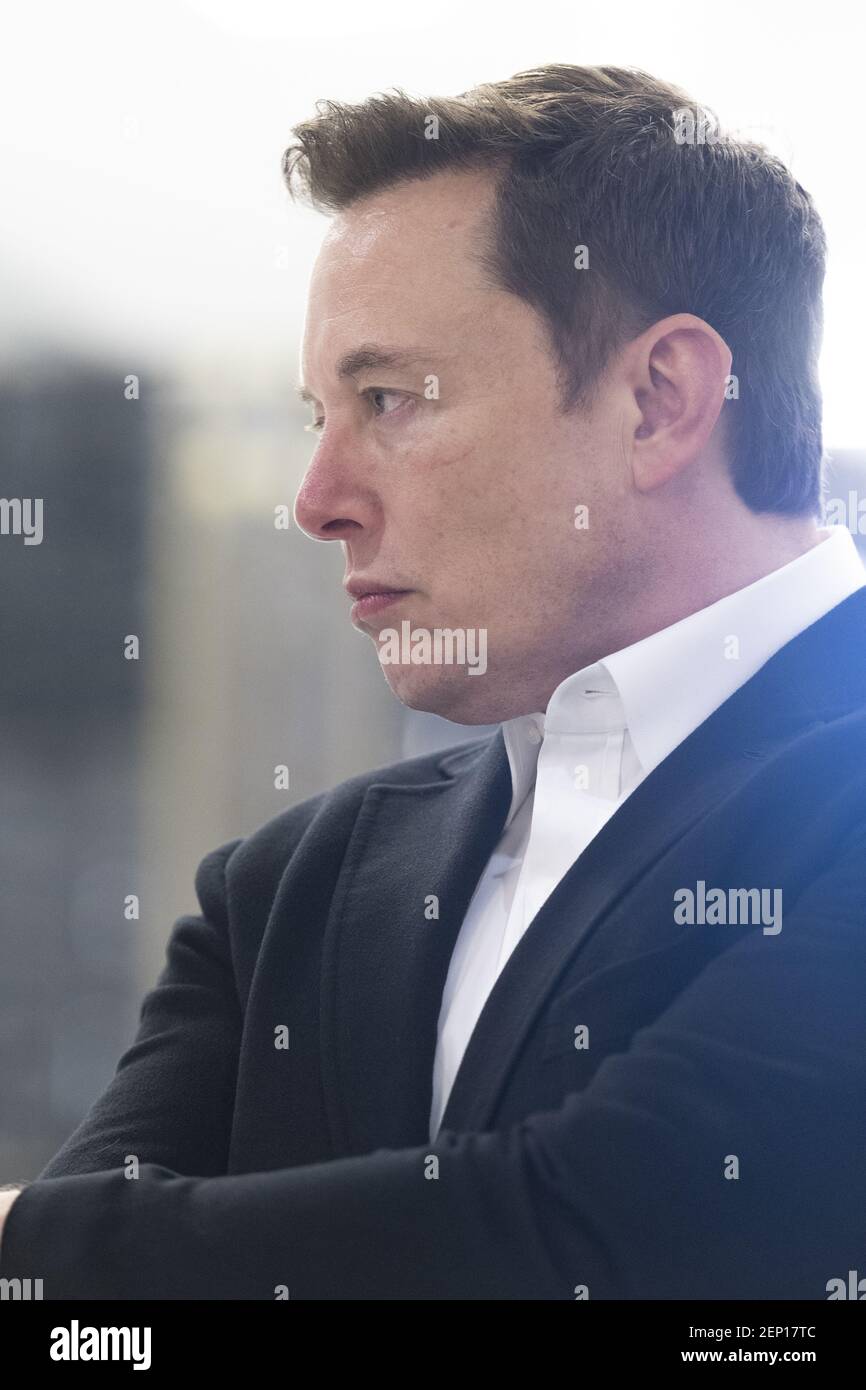 SpaceX Chief Engineer Elon Musk speaks to media in front of Crew Dragon