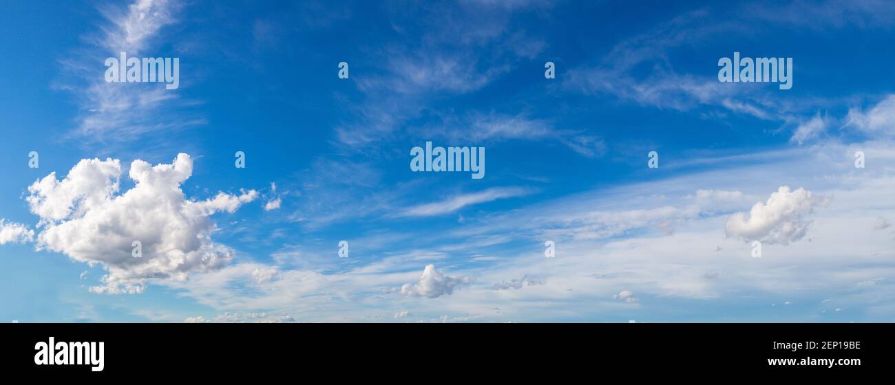 Blue sky with white clouds in a beautiful summer day Stock Photo - Alamy