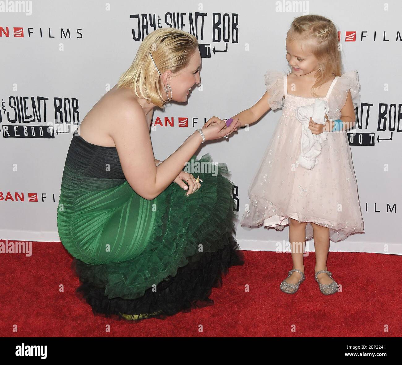 L-R) Harley Quinn Smith with Jason Mewes' daughter Logan Lee Mewes at the  JAY AND SILENT BOB REBOOT Los Angeles Screening held at the TCL Chinese  Theatre in Hollywood, CA on Monday,
