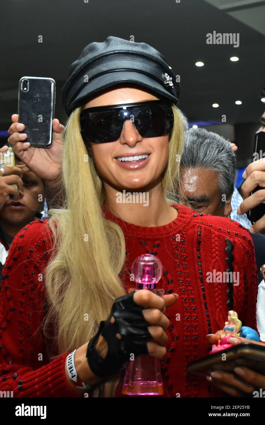 MEXICO CITY, MEXICO - OCTOBER 15: Socialite Paris Hilton show her perfume  during her arrive at Mexico City airport from Los Angeles to launch her new  perfume 'Electrify' on October 15, 2019