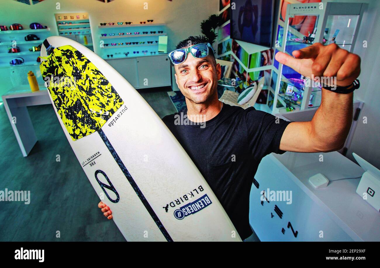 Surfer and company founder Chase Fisher poses for photos in the Blender