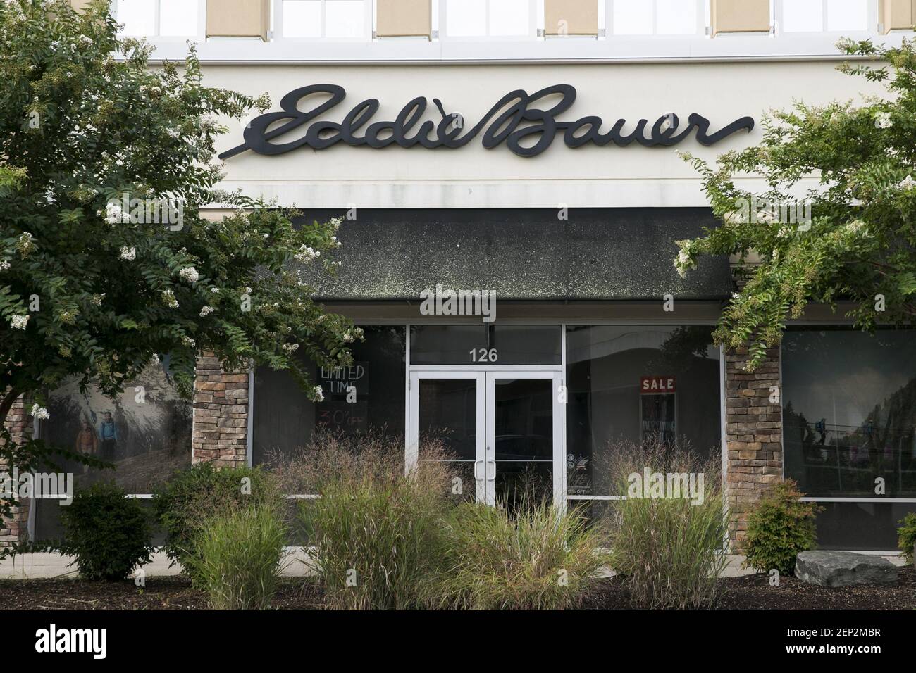 A logo sign outside of a Eddie Bauer retail store location in Queenstown, Maryland on August 5
