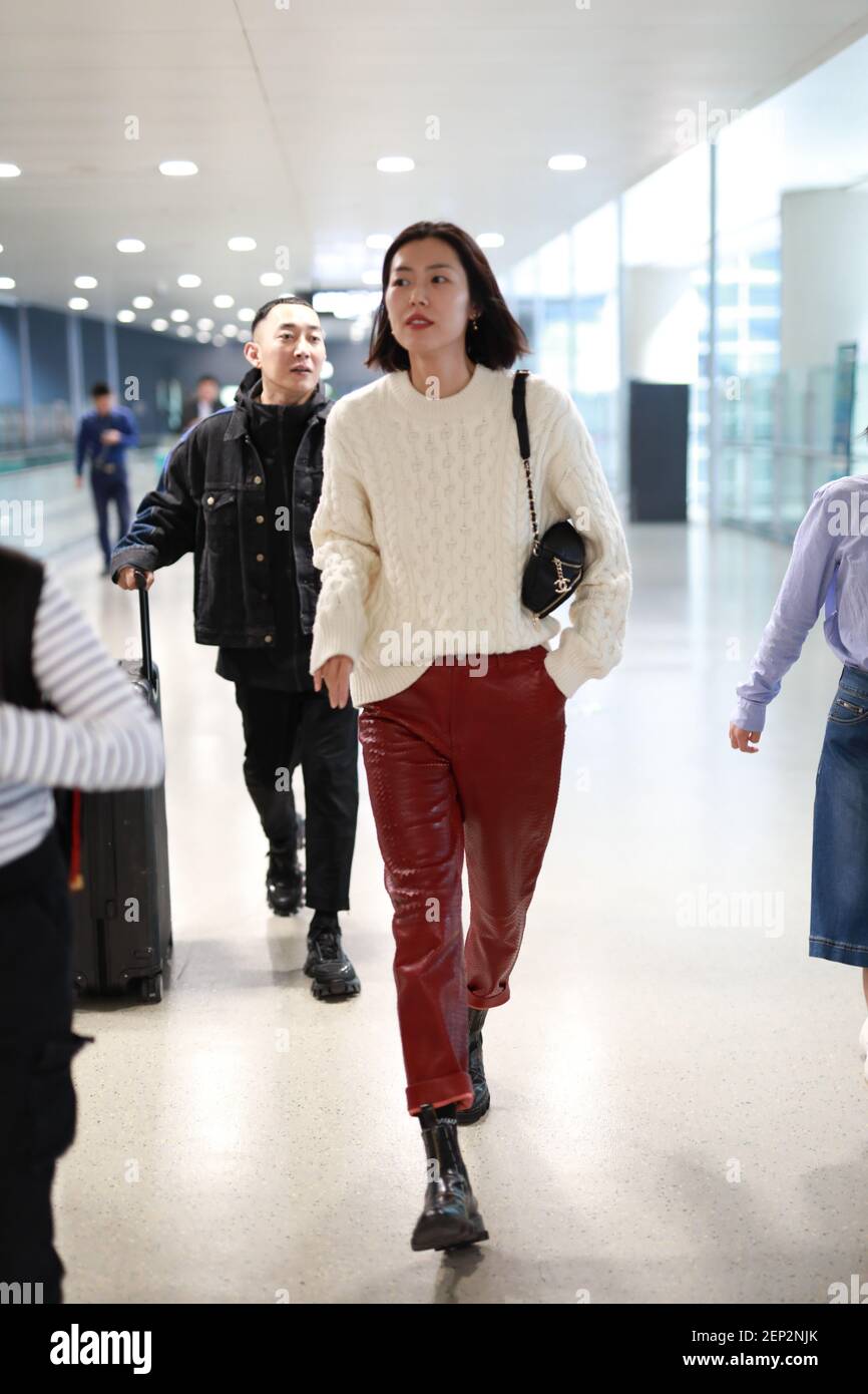 Chinese supermodel Liu Wen arrives at a Beijing airport after landing ...