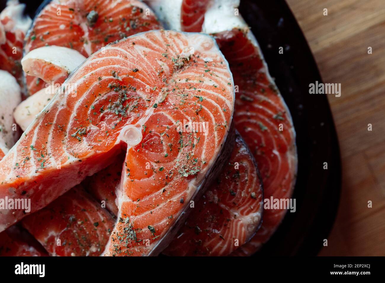 red fish marinated on a plate cooking seafood delicacy Stock Photo Alamy