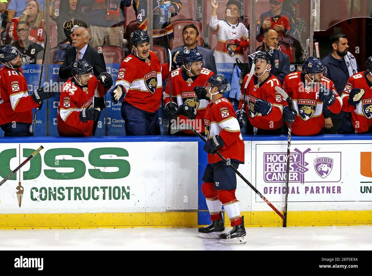 The Florida Panthers' Noel Acciari celebrates at the bench after netting a second-period goal against the Pittsburgh Penguins at the BB&T Center in Sunrise, Fla., on Tuesday, Oct. 22, 2019. (David Santiago/Miami Herald/TNS) Stock Photo