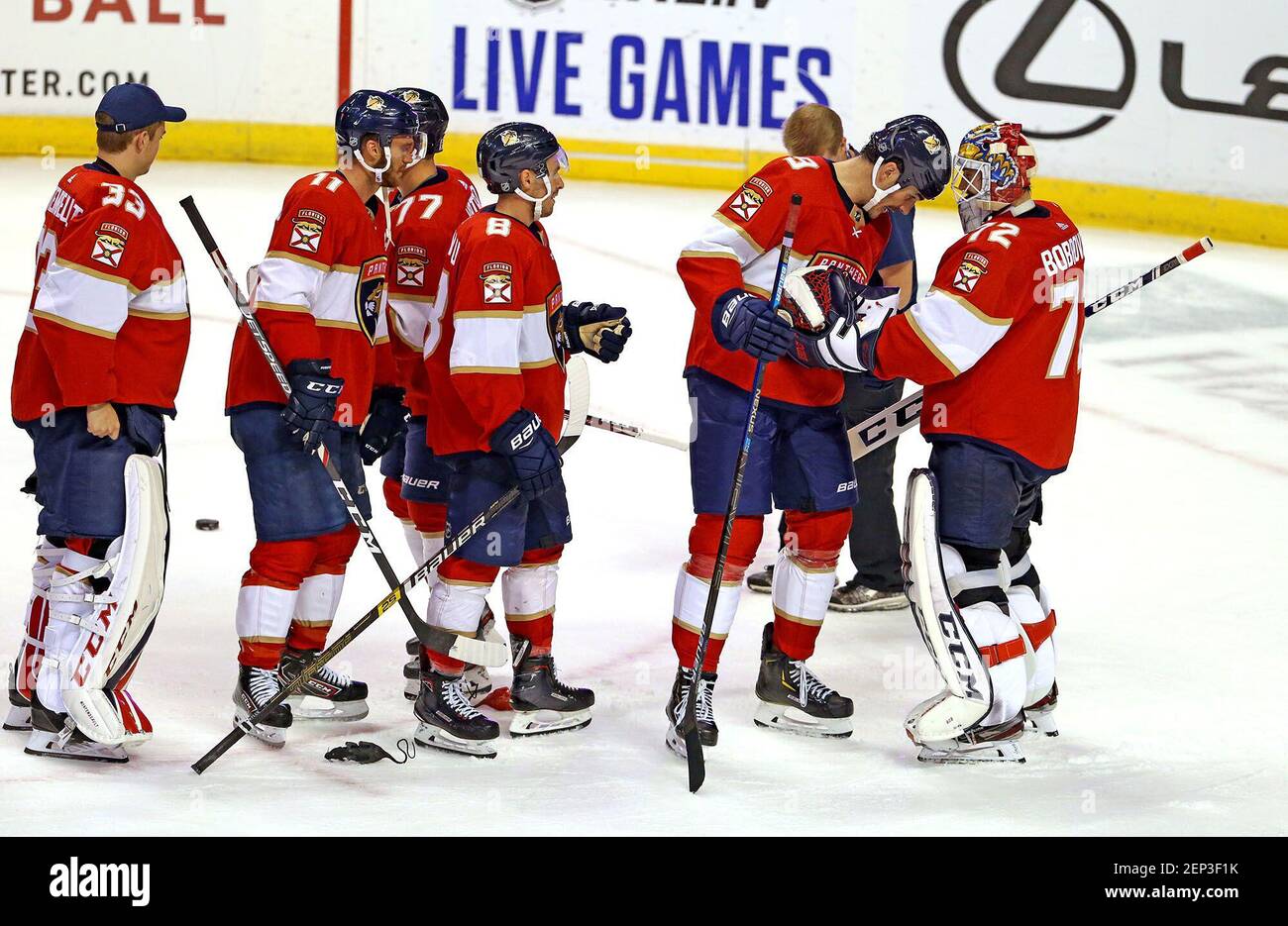 The Florida Panthers celebrate a 4-2 win against the Pittsburgh Penguins at the BB&T Center in Sunrise, Fla., on Tuesday, Oct. 22, 2019. (David Santiago/Miami Herald/TNS) Stock Photo