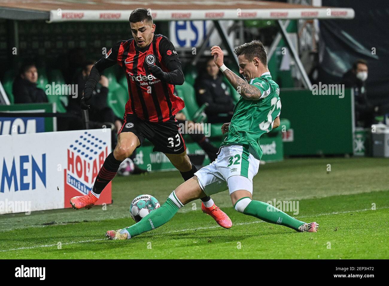 Bremen, Germany. 26th Feb, 2021. Andre Silva (L) of Frankfurt vies with Marco Friedl of Bremen during a German Bundesliga football match between Werder Bremen and Eintracht Frankfurt in Bremen, Germany, Feb. 26, 2021. Credit: Ulrich Hufnagel/Xinhua/Alamy Live News Stock Photo