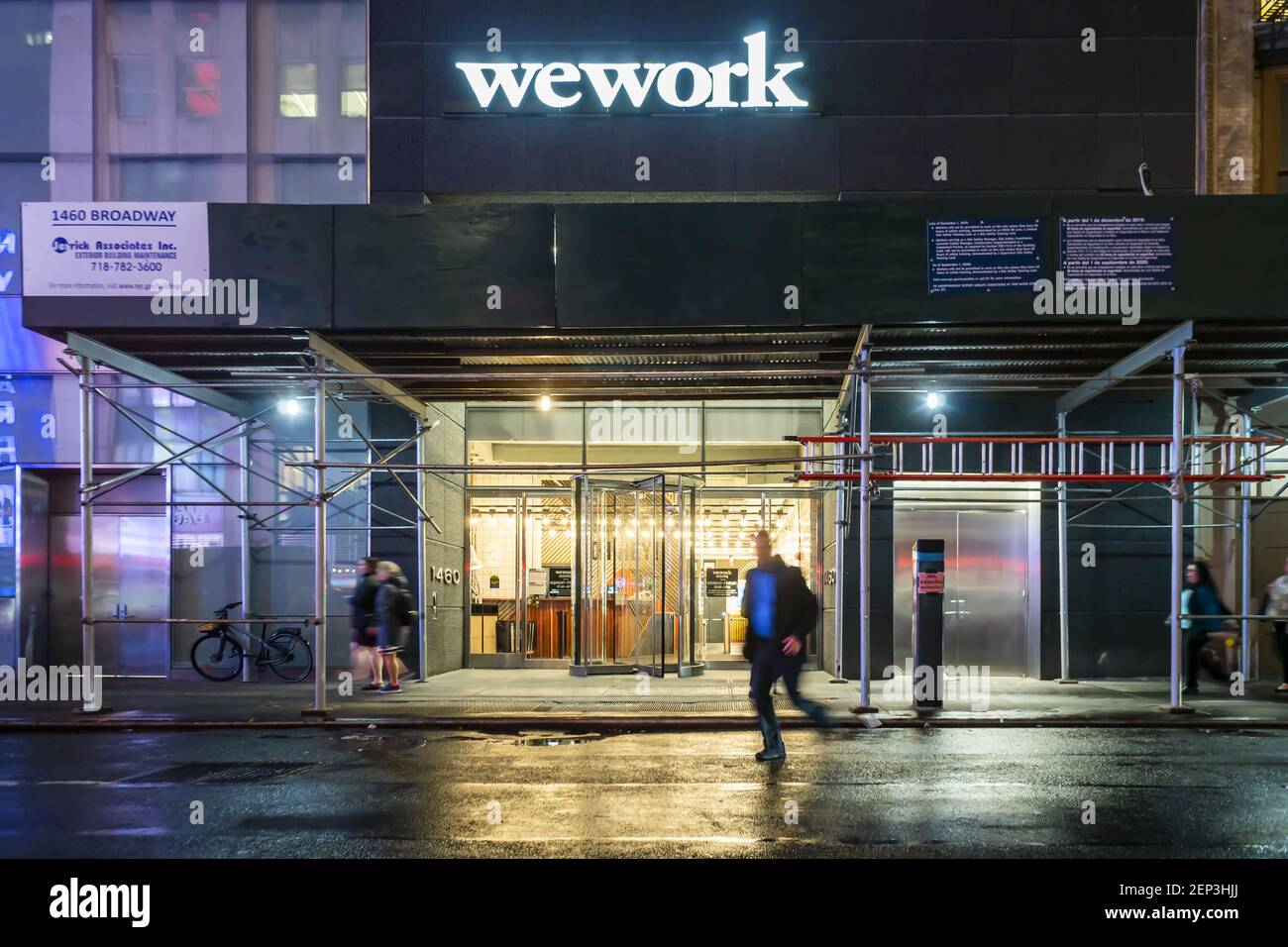 A sign announces the location of a WeWork coworking space location in