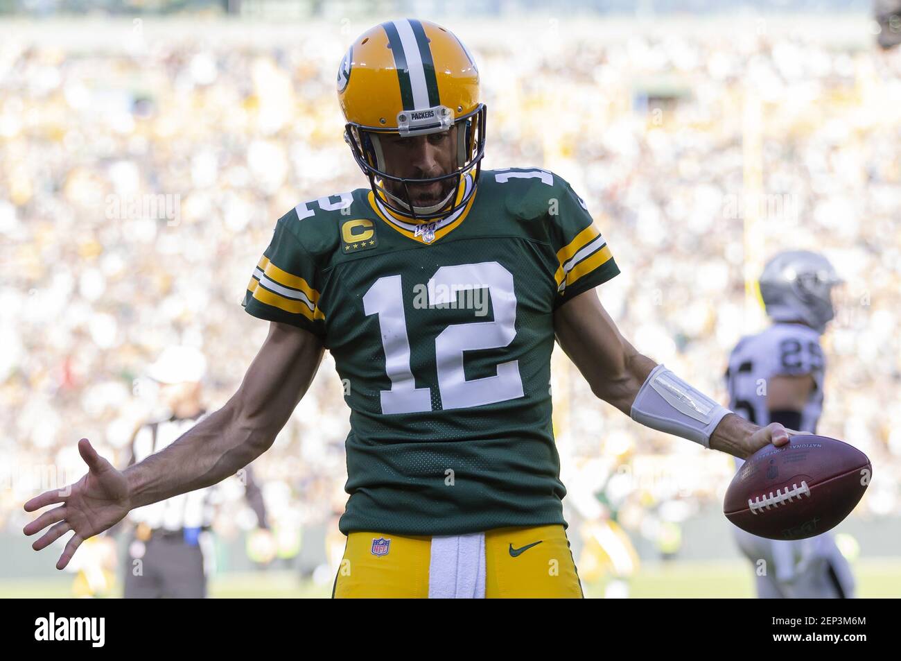 October 20, 2019: Green Bay Packers quarterback Aaron Rodgers #12 does his  ''belt'' celebration after a touchdown during the NFL Football game between  the Oakland Raiders and the Green Bay Packers at