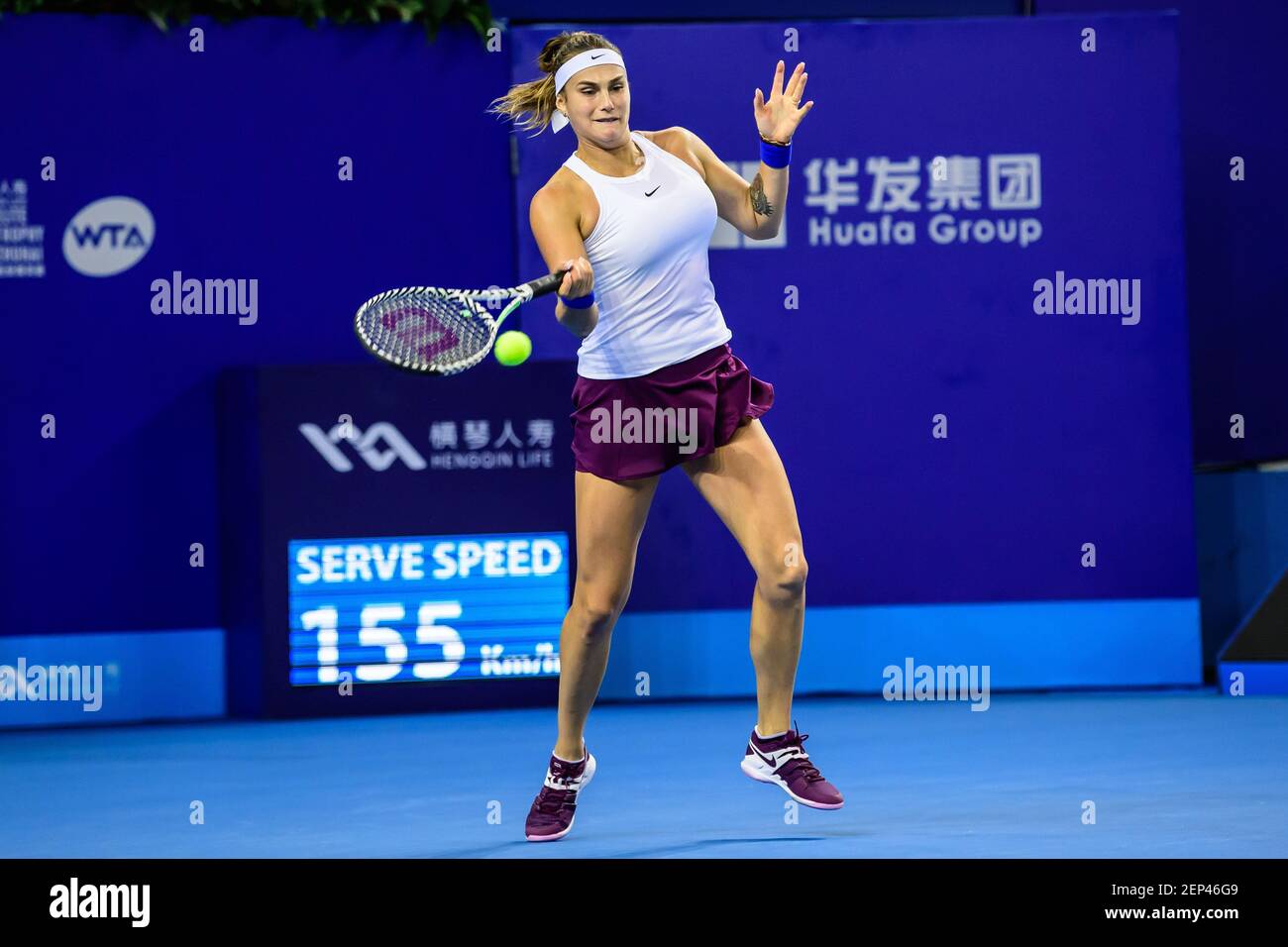 Aryna Sabalenka of Belarus gets the ball against Elise Mertens of